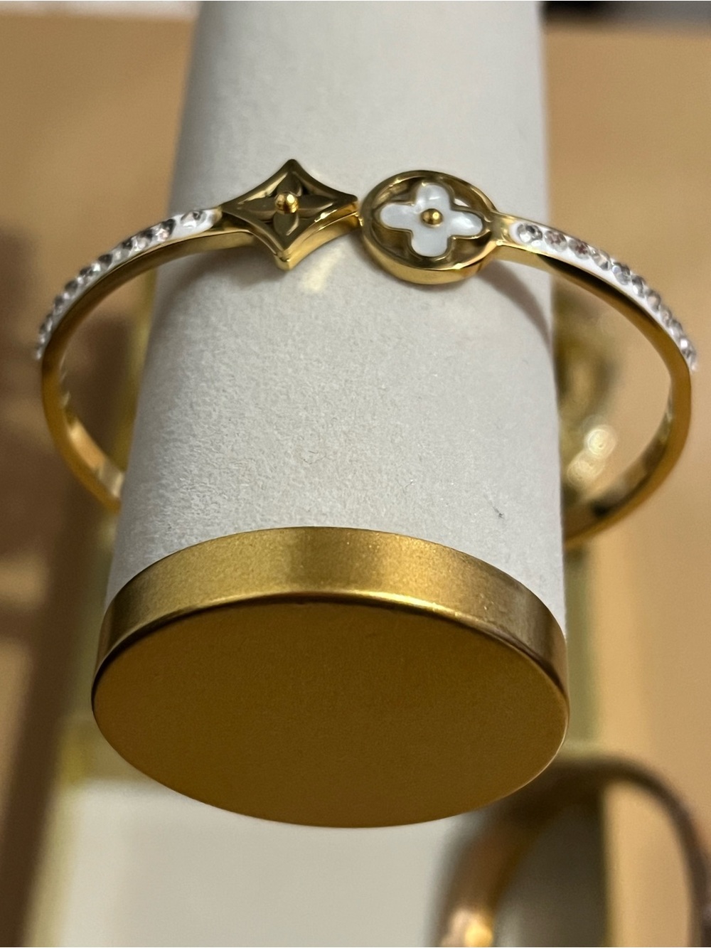 Gold-Tone Bracelet with White Enamel Motifs and Crystal Accents - Picture 2 of 5